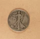 1920-D Walking Liberty Half Dollar, grades FN, Solid Rims, Better Early Date.